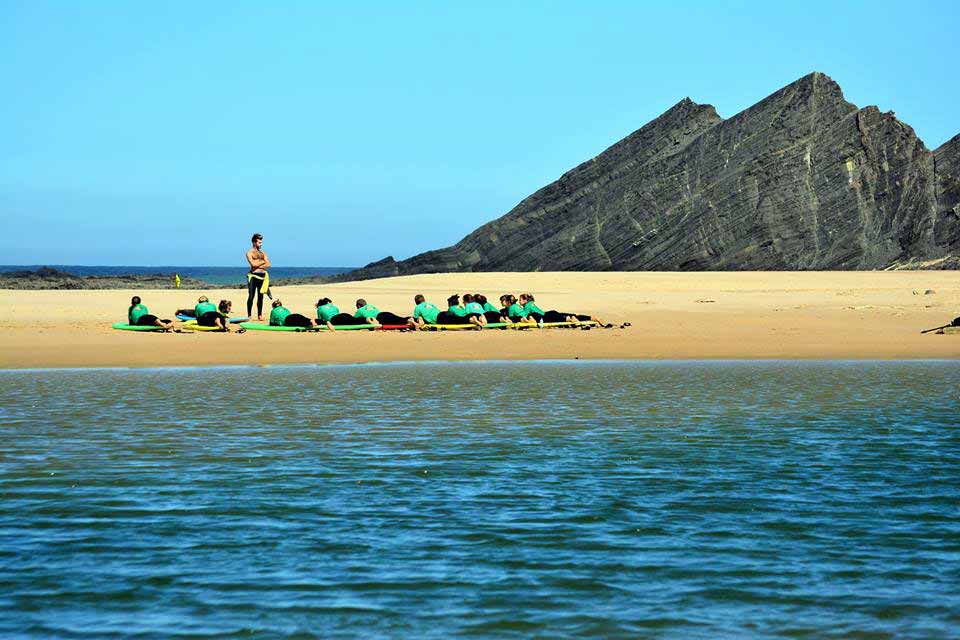 Odeceixe surfers preparing to go out to sea in Algarve