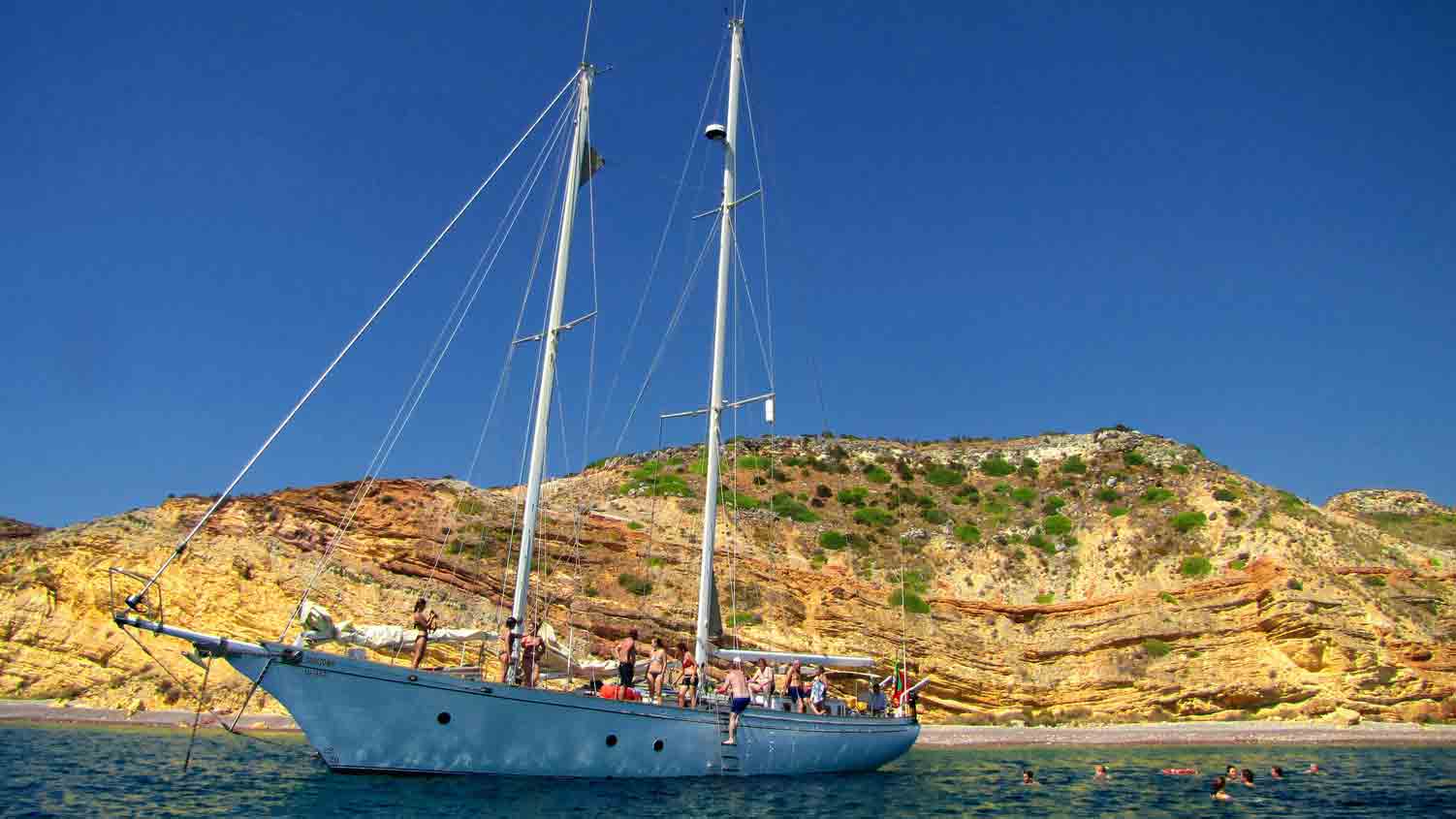 Boat sailing along Algarve coast
